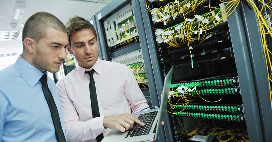 two men discussing network mapping